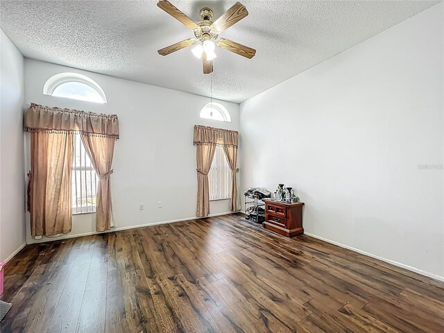 11216 Longbrooke Dr, Riverview, FL 33579 - spare room featuring hardwood / wood-style flooring, ceiling fan, a textured ceiling, and baseboards