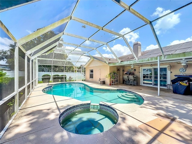 11216 Longbrooke Dr, Riverview, FL 33579 - view of swimming pool with a ceiling fan, a patio area, and a pool with connected hot tub