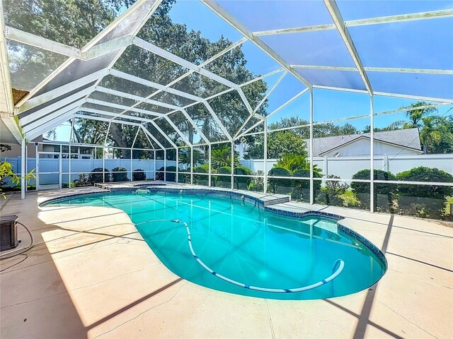11216 Longbrooke Dr, Riverview, FL 33579 - view of pool featuring a fenced backyard, a patio area, and a lanai