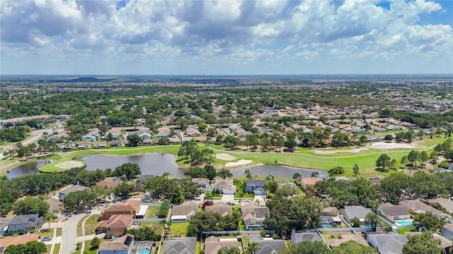 11216 Longbrooke Dr, Riverview, FL 33579 - aerial view of residential area with a local golf course and a nearby body of water