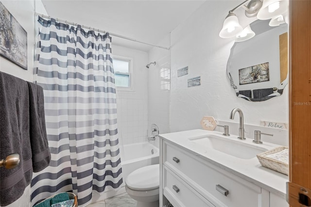 full bath with toilet, vanity, marble finish floor, and shower / tub combo with curtain