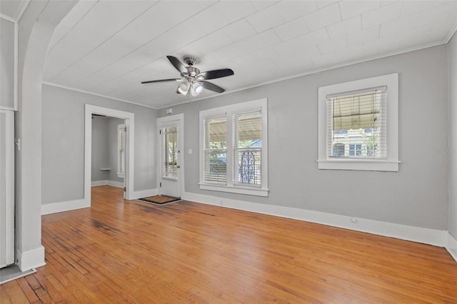 2450 3rd Ave N, Saint Petersburg, FL 33713 - unfurnished room with ornamental molding, light wood-type flooring, and ceiling fan