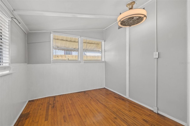 2450 3rd Ave N, Saint Petersburg, FL 33713 - empty room featuring hardwood / wood-style floors and vaulted ceiling