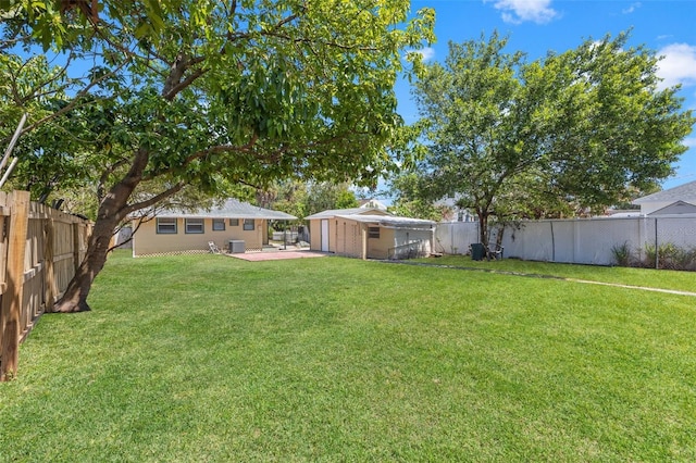 2450 3rd Ave N, Saint Petersburg, FL 33713 - fenced backyard with a patio area