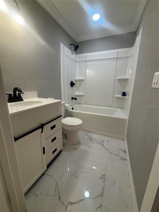 bathroom featuring vanity, crown molding, marble finish floor, toilet, and bathtub / shower combination