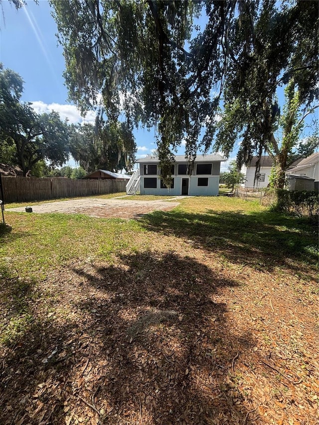 view of yard featuring fence