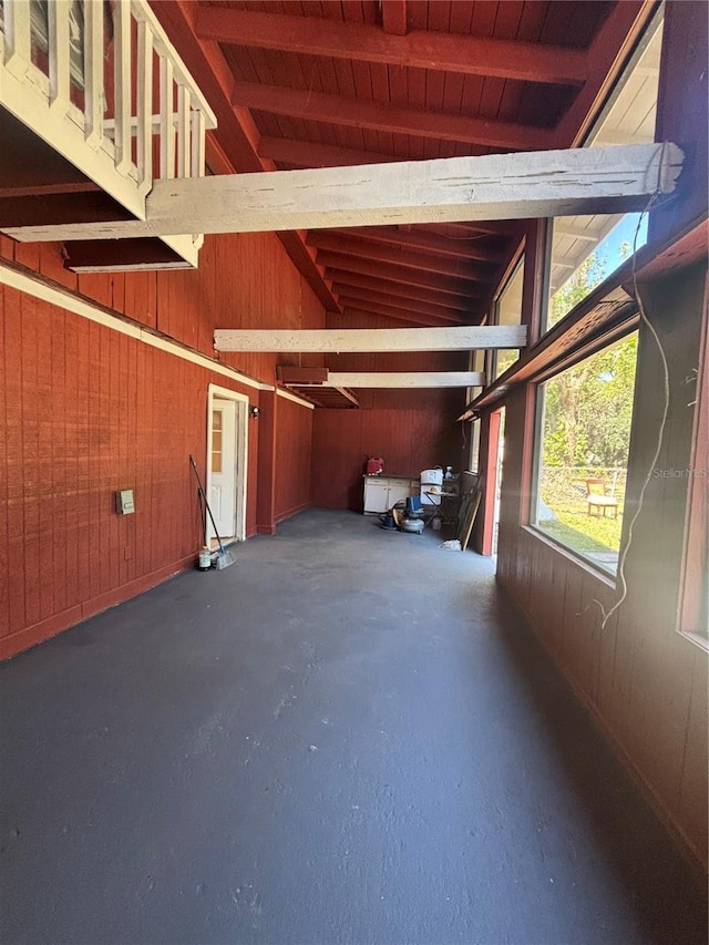 garage with wooden walls and wooden ceiling