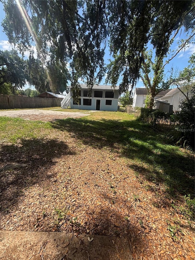 view of yard featuring fence
