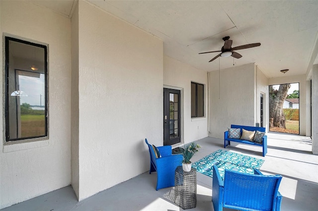 view of patio / terrace featuring ceiling fan