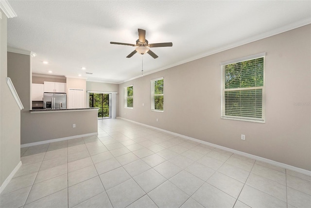 23378 Papyrus Way, Lutz, FL 33549 - unfurnished living room with a ceiling fan, baseboards, ornamental molding, and light tile patterned floors