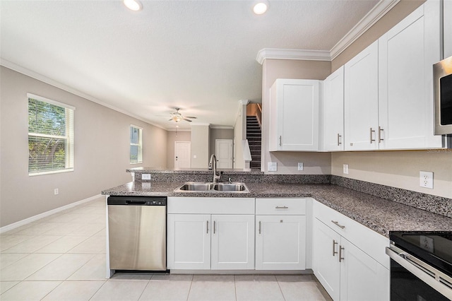 23378 Papyrus Way, Lutz, FL 33549 - kitchen with a ceiling fan, a sink, dishwasher, a peninsula, and ornamental molding