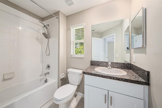 23378 Papyrus Way, Lutz, FL 33549 - bathroom with washtub / shower combination, visible vents, toilet, vanity, and baseboards