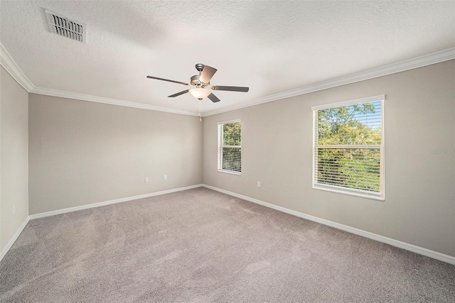 23378 Papyrus Way, Lutz, FL 33549 - empty room with a ceiling fan, light carpet, crown molding, and visible vents