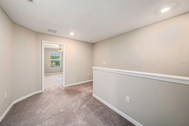 23378 Papyrus Way, Lutz, FL 33549 - corridor featuring baseboards, visible vents, carpet floors, and recessed lighting