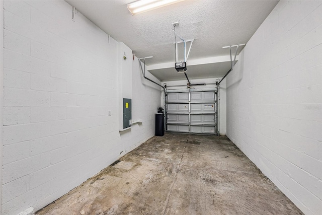 23378 Papyrus Way, Lutz, FL 33549 - garage featuring concrete block wall and a garage door opener