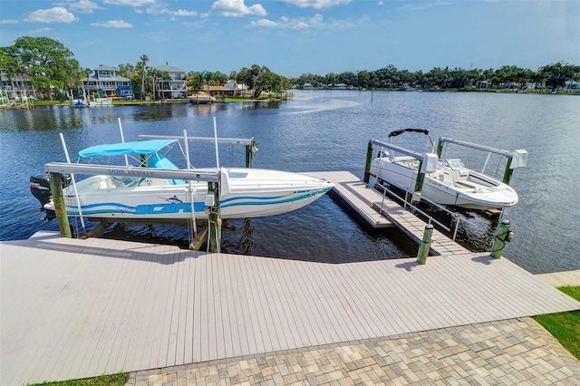 5449 Manatee Point Dr, New Port Richey, FL 34652 - dock featuring boat lift and a water view