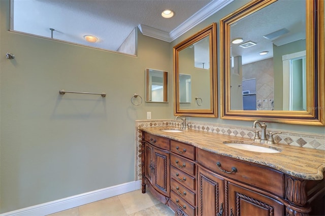 5449 Manatee Point Dr, New Port Richey, FL 34652 - bathroom with double vanity, ornamental molding, tile patterned floors, and a textured ceiling