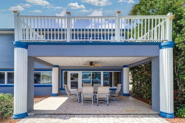 5449 Manatee Point Dr, New Port Richey, FL 34652 - patio / terrace featuring ceiling fan, a patio, and outdoor dining space