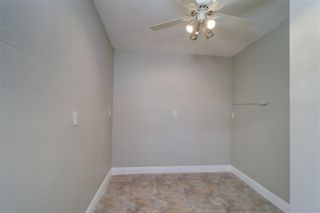 5449 Manatee Point Dr, New Port Richey, FL 34652 - empty room with a ceiling fan and baseboards