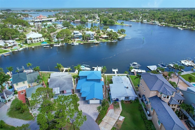 5449 Manatee Point Dr, New Port Richey, FL 34652 - aerial view of residential area with a nearby body of water