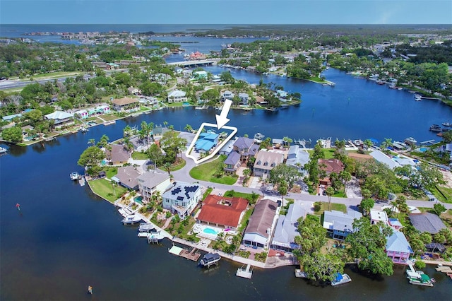 5449 Manatee Point Dr, New Port Richey, FL 34652 - aerial view of residential area with a nearby body of water