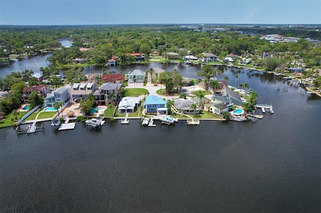 5449 Manatee Point Dr, New Port Richey, FL 34652 - aerial perspective of suburban area featuring a large body of water