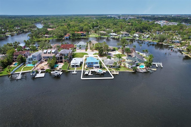 5449 Manatee Point Dr, New Port Richey, FL 34652 - aerial view of residential area featuring a nearby body of water
