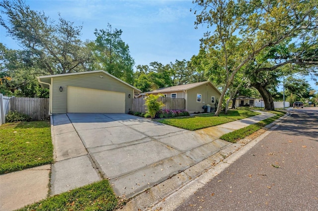 1155 Withlacoochee St, Safety Harbor, FL 34695 - ranch-style home with fence and a front yard