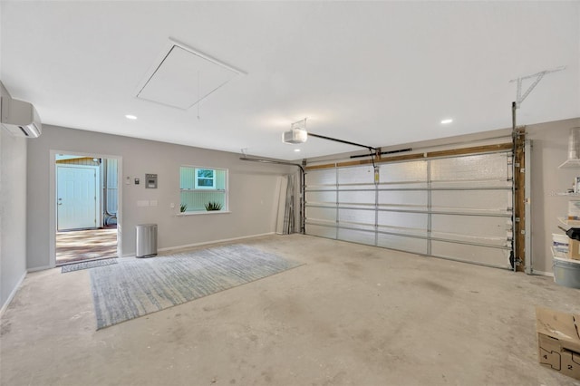 1155 Withlacoochee St, Safety Harbor, FL 34695 - garage featuring a garage door opener, recessed lighting, an AC wall unit, and baseboards