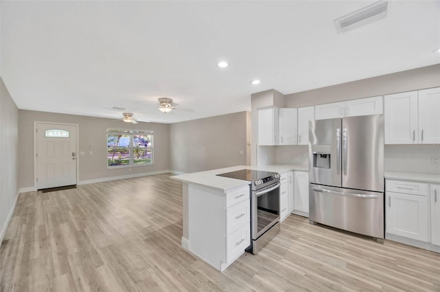 1155 Withlacoochee St, Safety Harbor, FL 34695 - kitchen with a ceiling fan, open floor plan, light countertops, appliances with stainless steel finishes, and visible vents