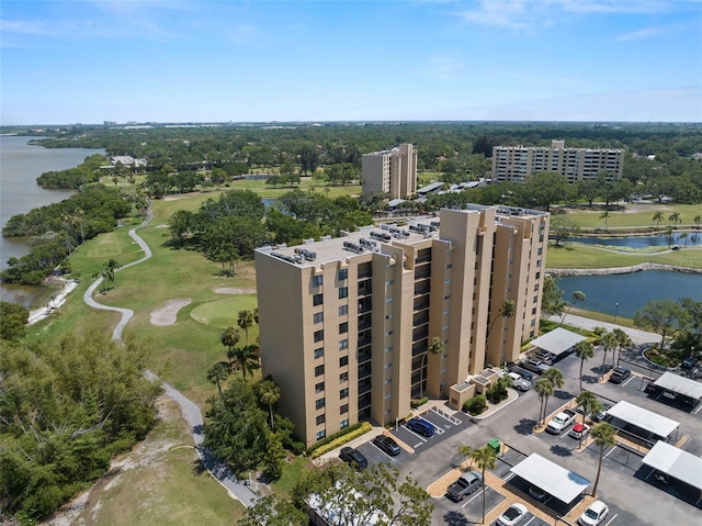 2616 Cove Cay Dr Unit 803, Clearwater, FL 33760 - drone / aerial view of apartment complex, a large body of water, and a golf club