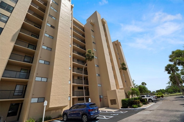 2616 Cove Cay Dr Unit 803, Clearwater, FL 33760 - view of apartment building / complex featuring uncovered parking