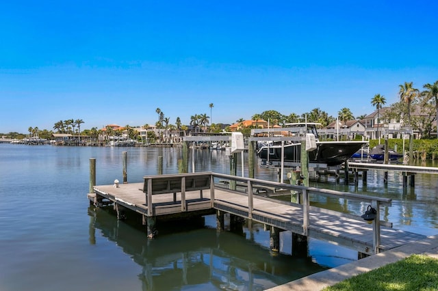 view of dock featuring a water view and boat lift