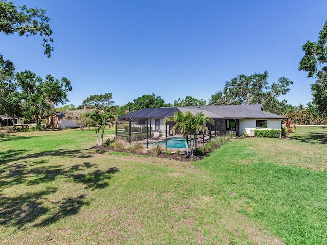6310 95th St E, Bradenton, FL 34202 - view of yard with a lanai and an outdoor pool