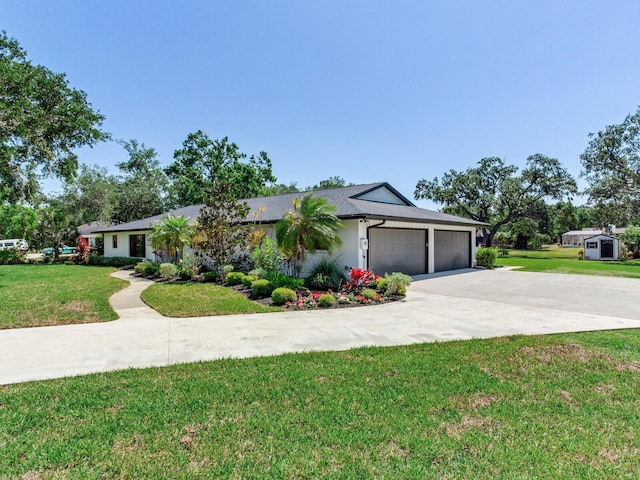 6310 95th St E, Bradenton, FL 34202 - ranch-style house with a garage, driveway, and a front yard