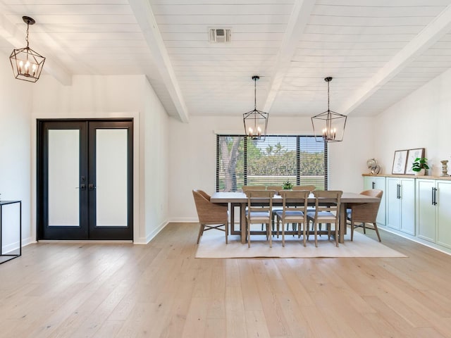 6310 95th St E, Bradenton, FL 34202 - dining area with light wood-style floors, a chandelier, french doors, and visible vents