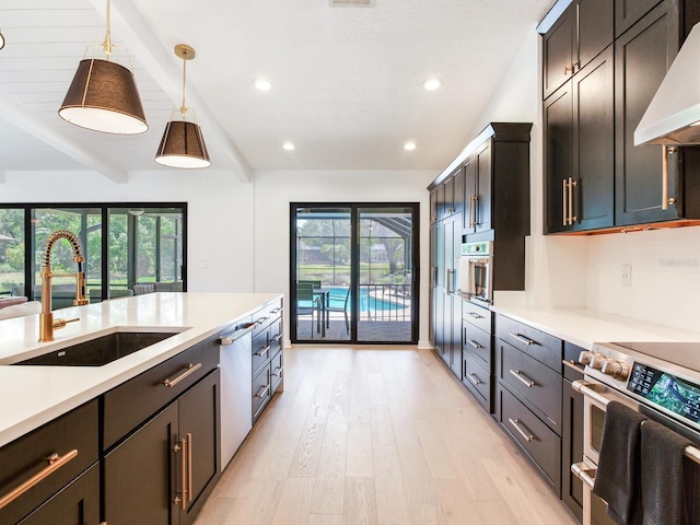 6310 95th St E, Bradenton, FL 34202 - kitchen featuring stainless steel electric range, dishwasher, a sink, light countertops, and light wood-style floors
