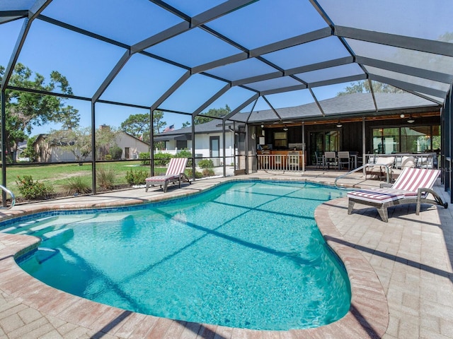 6310 95th St E, Bradenton, FL 34202 - pool with outdoor dining area, a lanai, ceiling fan, and a patio area