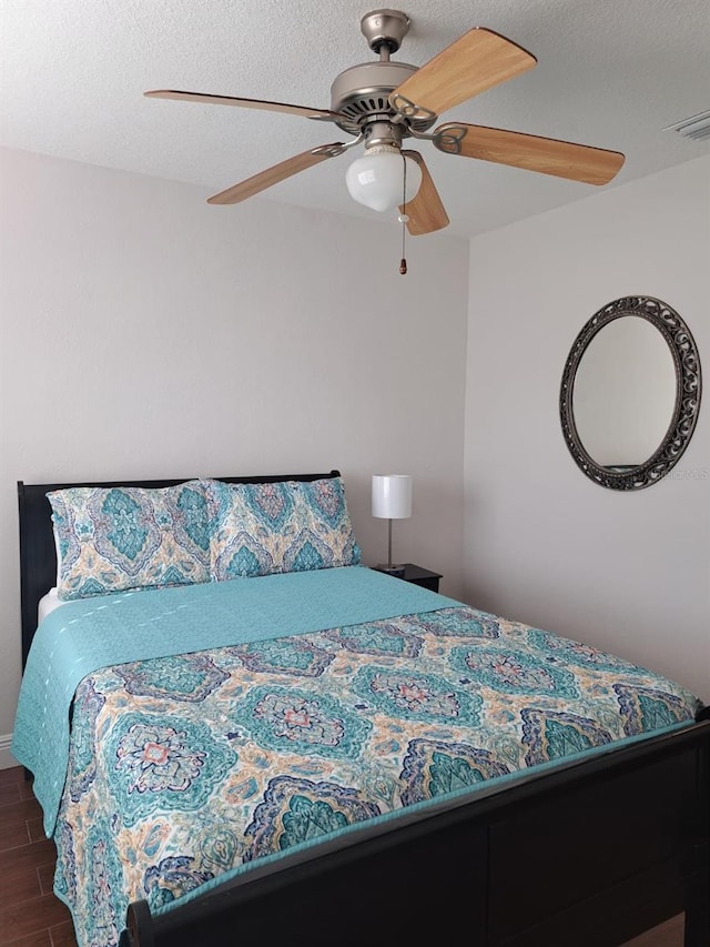 7503 N Howard Ave, Tampa, FL 33604 - bedroom featuring visible vents, ceiling fan, and wood finished floors
