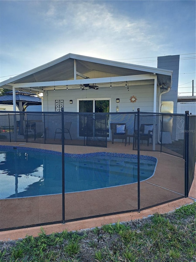 7503 N Howard Ave, Tampa, FL 33604 - view of swimming pool featuring a fenced in pool, a patio area, and fence