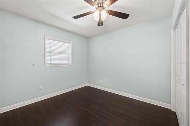 4519 S Grady Ave, Tampa, FL 33611 - empty room featuring baseboards, ceiling fan, and dark wood-style flooring
