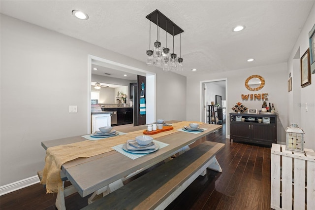 4519 S Grady Ave, Tampa, FL 33611 - dining room with dark wood-type flooring, recessed lighting, a textured ceiling, and baseboards
