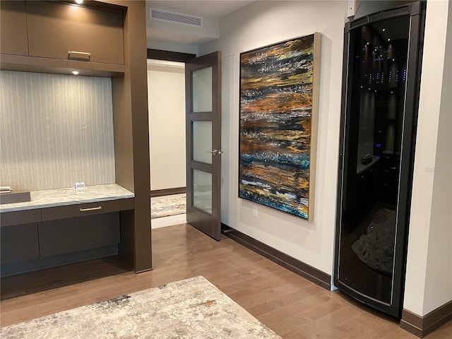 3301 Bayshore Blvd Unit 2401E, Tampa, FL 33629 - mudroom featuring baseboards, light wood-style flooring, and visible vents