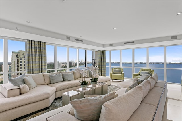 3301 Bayshore Blvd Unit 2401E, Tampa, FL 33629 - living area featuring visible vents, a water view, and tile patterned flooring