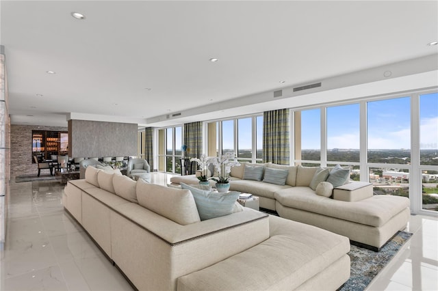 3301 Bayshore Blvd Unit 2401E, Tampa, FL 33629 - living area with a healthy amount of sunlight, marble finish floor, and visible vents