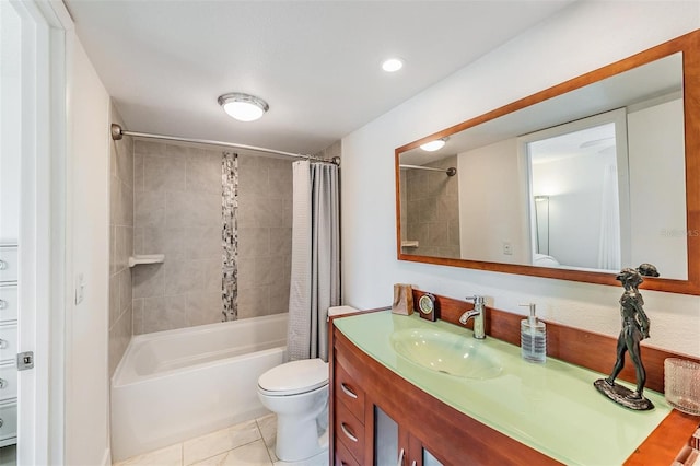 bathroom featuring tile patterned floors, vanity, shower / tub combo with curtain, toilet, and recessed lighting