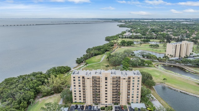aerial view with view of golf course and a water view