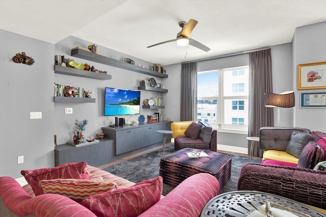 1238 E Kennedy Blvd Unit 702, Tampa, FL 33602 - living room featuring a ceiling fan, baseboards, and wood finished floors