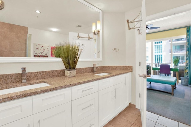 1238 E Kennedy Blvd Unit 702, Tampa, FL 33602 - bathroom featuring double vanity, tile patterned flooring, ensuite bath, and recessed lighting