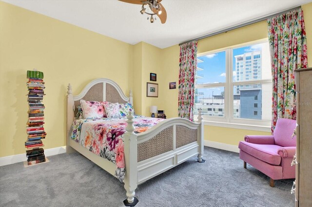 1238 E Kennedy Blvd Unit 702, Tampa, FL 33602 - carpeted bedroom featuring baseboards and a ceiling fan